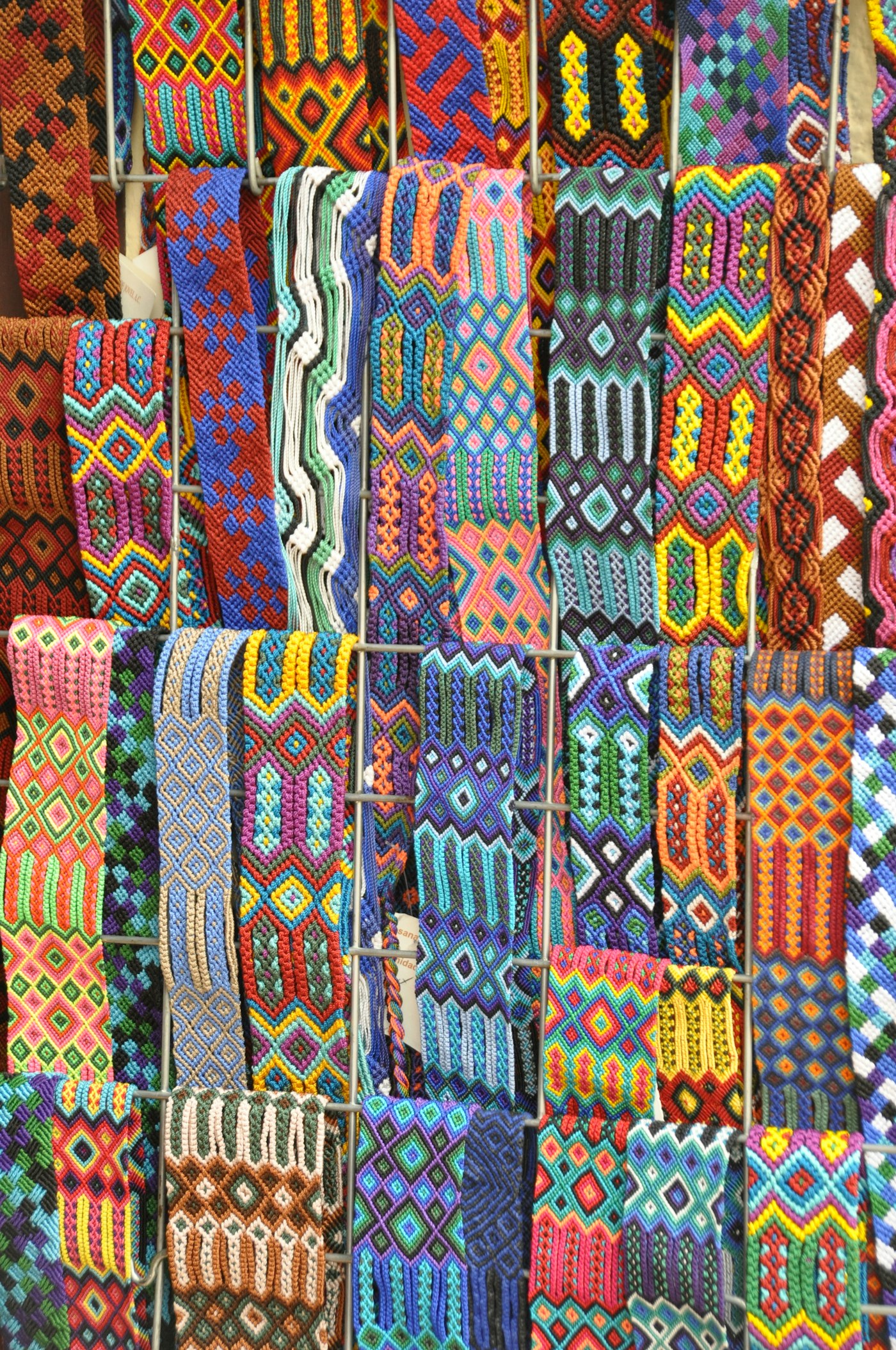 Handwoven textiles hanging before they are worn